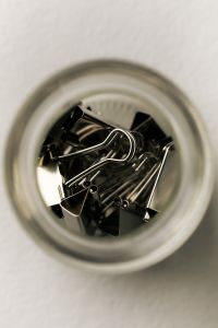 Kaboompics - Metal Binder Clips in Glass Jar