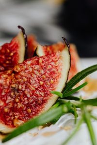 Kaboompics - Soft-Focus Fresh Fig Macro with Rosemary and Camembert