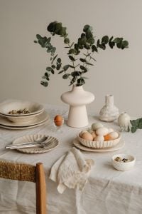 Kaboompics - Neutral Easter Table With Eucalyptus Vase And Pastel Eggs