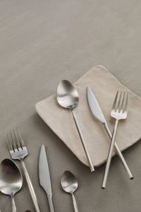 Kaboompics - Matte Steel Cutlery on Folded Napkin with Minimal Neutral Copy Space