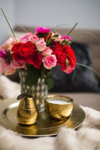Kaboompics - Red and Pink Rose Bouquet Against a Soft Neutral Wall