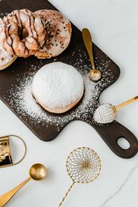 Kaboompics - Homemade Raspberry Polish Paczki Donut with Powdered Sugar