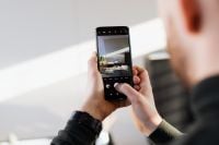 Kaboompics - Man Takes Photo by Mobile Phone
