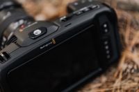 Kaboompics - Blackmagic Cinema Camera Body Close-Up on Forest Ground