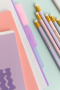 Kaboompics - Pastel Notebooks and Pencils with Wavy Cover