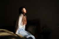 Kaboompics - Woman Relaxing on Bed in a Calm Bedroom