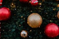 Kaboompics - Red and Gold Christmas Ornaments with Warm Tree Lights
