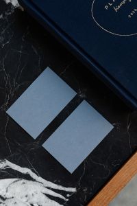 Kaboompics - Blue Business Card Mockups with Navy Planner on Black Marble
