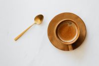 Kaboompics - Minimal Coffee Cup and Golden Spoon on White Table