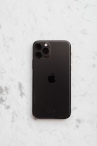 Kaboompics - Black Apple iPhone 11 Pro on White Marble