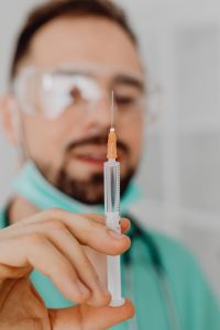Kaboompics - Close-Up of Syringe in Doctor's Hands