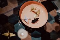 Kaboompics - Origami Birds Displayed in a Round Shallow Dish