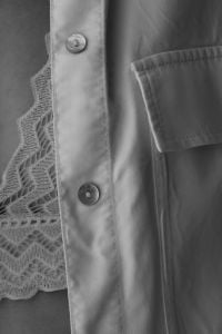 Kaboompics - Feminine Lace Detail Beneath White Cotton Shirt