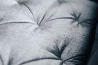 Kaboompics - Close-up of a grey sofa