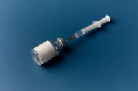 Kaboompics - Syringe Drawing Liquid from Medical Vial