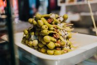 Kaboompics - Green Olive Pinchos on Cocktail Sticks at Madrid Market