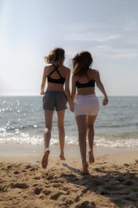 Kaboompics - Two Women Walking into the Sea