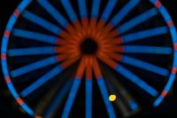 Kaboompics - Blue Ferris Wheel Spokes with a Warm Amber Center