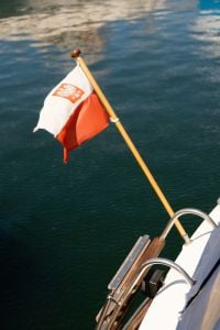 Kaboompics - Polish Flag on Sailboat Stern