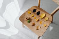 Kaboompics - Fallen Leaves and Acorns on a Wooden Chair