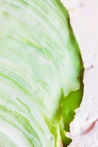 Kaboompics - Close-Up Green Paint Edge on White, Minimal Abstract Texture with Copy Space