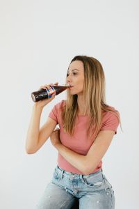 Kaboompics - Young woman with Pepsi Cola bottle