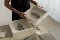 Kaboompics - Textured Sculptural Wall Art Pieces Arranged in Framed Panels