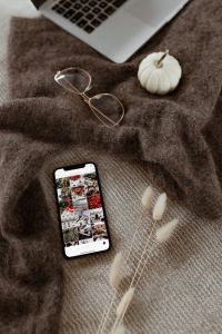 Kaboompics - Laptop, glasses, small white pumpkin and iPhone X