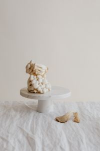 Kaboompics - White Mushroom Arrangement on Cake Stand