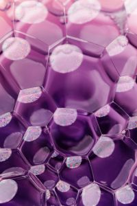 Kaboompics - Purple Skincare Gel with Iridescent Foam Bubbles and Glossy Cell Texture