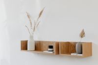 Kaboompics - Neutral Wall Shelf Styling with Pampas Grass, Candle and Palm Vase