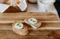 Kaboompics - Rustic Goat Cheese Appetizer on a Wooden Serving Board