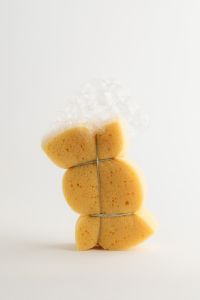 Kaboompics - Stacked Yellow Cleaning Sponges