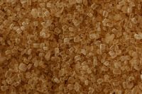 Kaboompics - Dark Brown Sugar Crystals in a Dense Macro Texture, Warm Baking Background