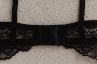 Kaboompics - Black Lace Bra in Minimal Flat Lay