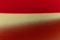 Kaboompics - Minimal Red and Pale Green Curved Abstract Background
