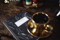 Kaboompics - Cup of coffee & Notebook