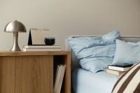 Kaboompics - Cozy Bedroom With Blue Bedding Books and Bedside Lamp