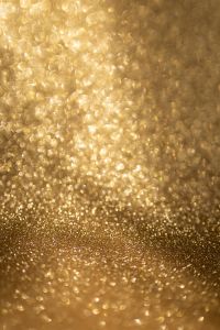 Kaboompics - Golden Glitter Backdrop With Bright Bokeh and Reflective Floor