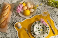 Kaboompics - Overhead Easter Brunch Table with Eggs, Grapes, Baguette and Hyacinth