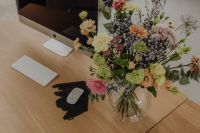 Kaboompics - Top View of a Floral Desk with iMac, Keyboard and Colorful Bouquet