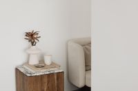 Kaboompics - Neutral Living Room Furniture with Walnut Pedestal, Sculptural Vase and Copy Space