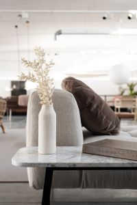 Kaboompics - Vase and Books on Marble Side Table in Neutral Living Room