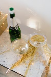 Kaboompics - New Year's Eve Champagne Display With Gift Boxes
