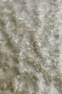 Kaboompics - Blurred Faceted Glass Texture with Layered Patchwork Highlights