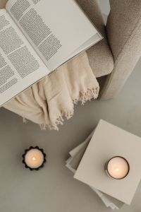 Kaboompics - Overhead View of Reading Corner with Two Candles and Armchair