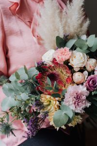 Kaboompics - Pink Carnations and Pampas Grass in a Wrapped Bouquet