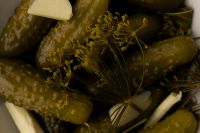 Kaboompics - Moody Pickles with Dill Flowers in a Dark Macro Food Close-Up