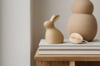 Kaboompics - Neutral Easter Decor With Ceramic Bunny, Books And Paper Egg