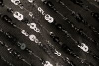 Kaboompics - Silver Sequin Textile with Soft Folds